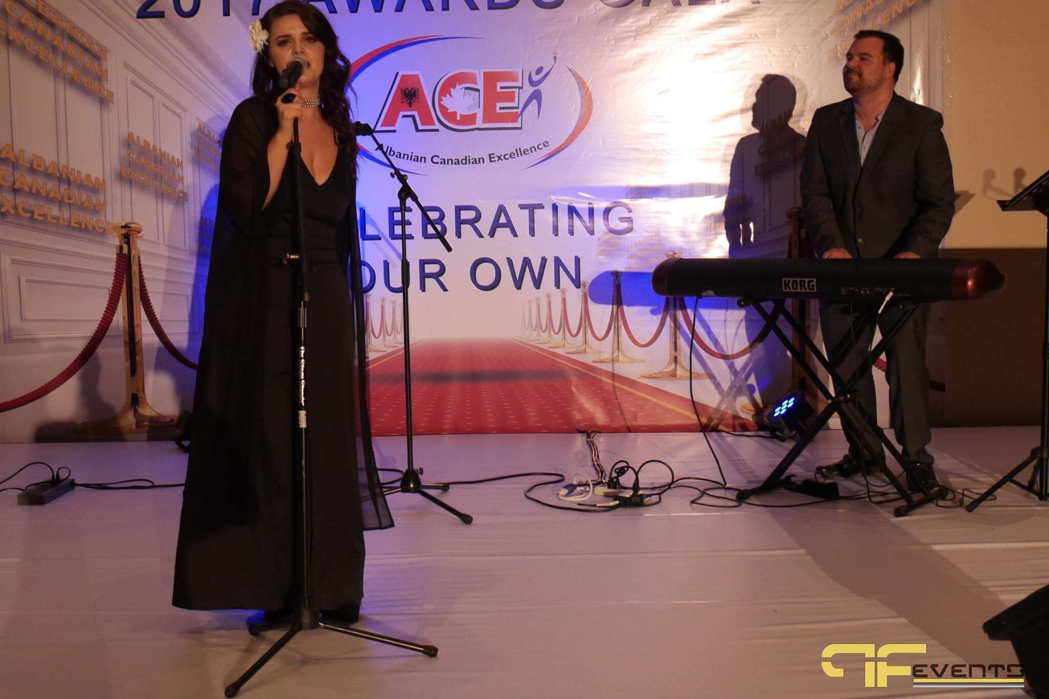 Vocalist and Korg keyboardist on stage at the ACE 2017 Awards Gala